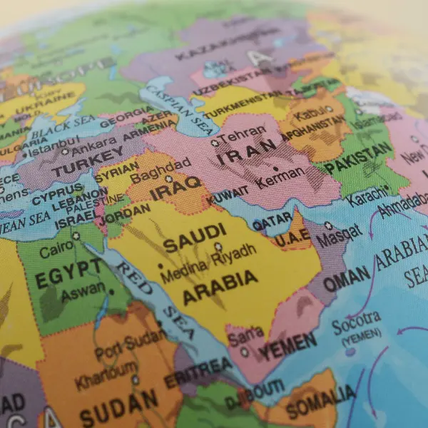 Colourful globe showing North Africa and the Middle East region. Saudi Arabia, Turkey, and Pakistan are visible.