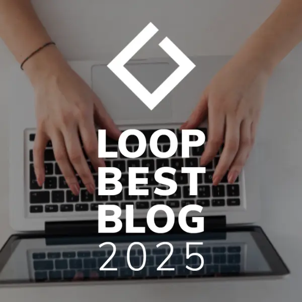 Hands typing on a laptop with text 